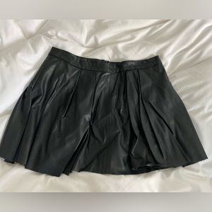 BLANK NYC VEGAN LEATHER PLEATED SKIRT